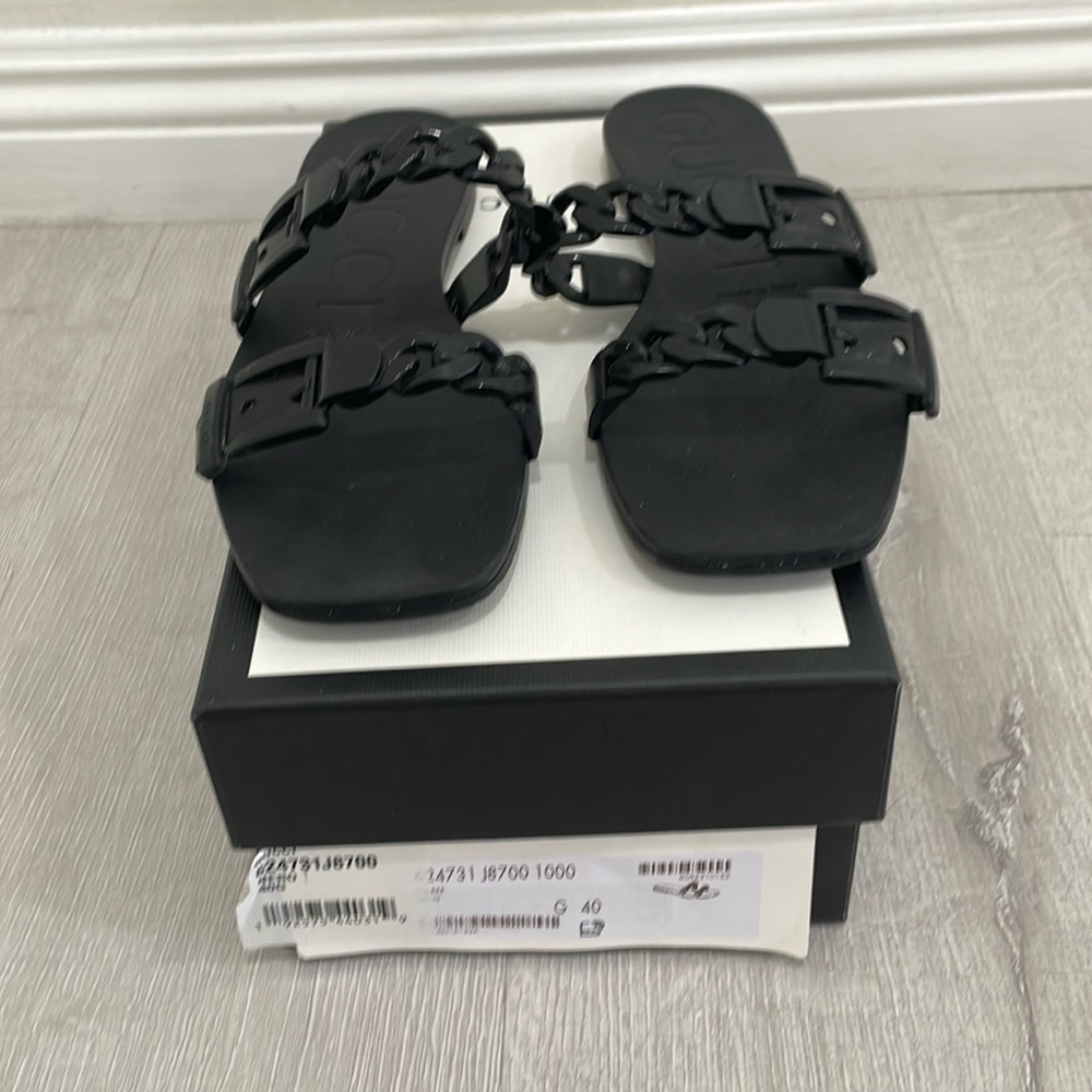 Black Gucci pool sandals